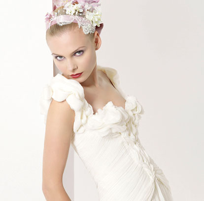 wedding dresses, veils, headpieces and wraps by Rosa Clara, Christian Lacroix and Jesus Del Pozo wedding dresses, veils, headpieces and wraps by Rosa Clara, Christian Lacroix and Jesus Del Pozo