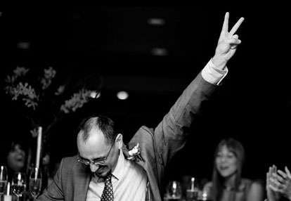 Wedding reception toast celebration image by Yours by John Photography Wedding reception toast celebration image by Yours by John Photography