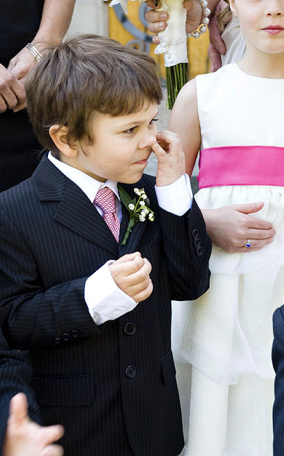 Mischievous little ring bearer at a wedding, image by Laurel McConnell Photography Mischievous little ring bearer at a wedding, image by Laurel McConnell Photography