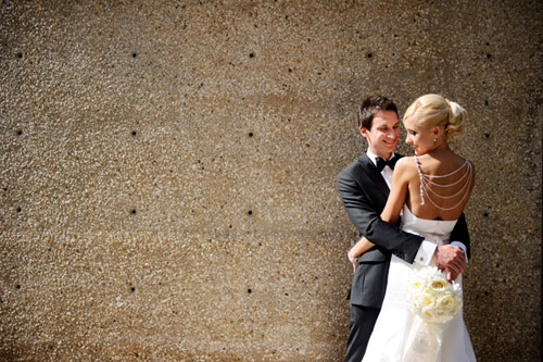 elegant Chicago wedding at Trump Tower, stylish wedding dress and bridal necklace, classic black tuxedo, wedding photos by Nakai Photography elegant Chicago wedding at Trump Tower, stylish wedding dress and bridal necklace, classic black tuxedo, wedding photos by Nakai Photography